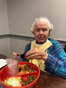 Angels for the Elderly memory care resident dining in Montgomery, AL