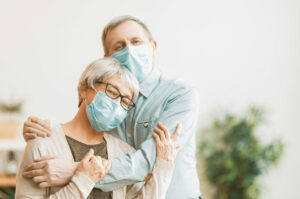 Lake Howard Heights | Senior couple smiling in masks