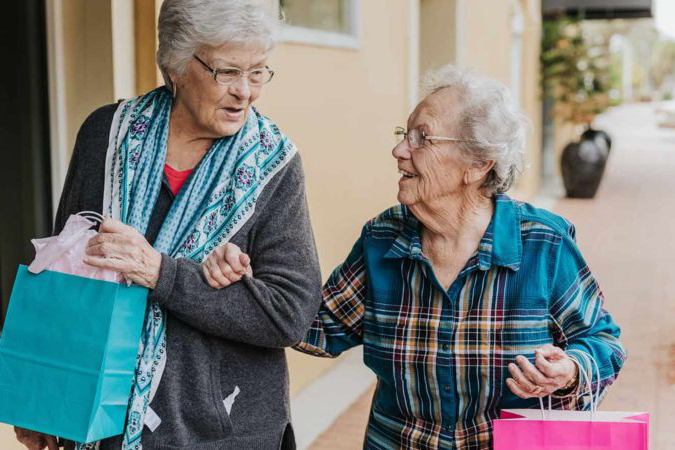 Lake Howard Heights | Senior women with gift bags