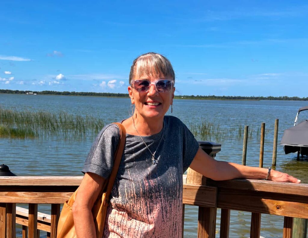 Older adult enjoying an active, independent lifestyle by the lake at Lake Howard Heights in Winter Haven, FL.