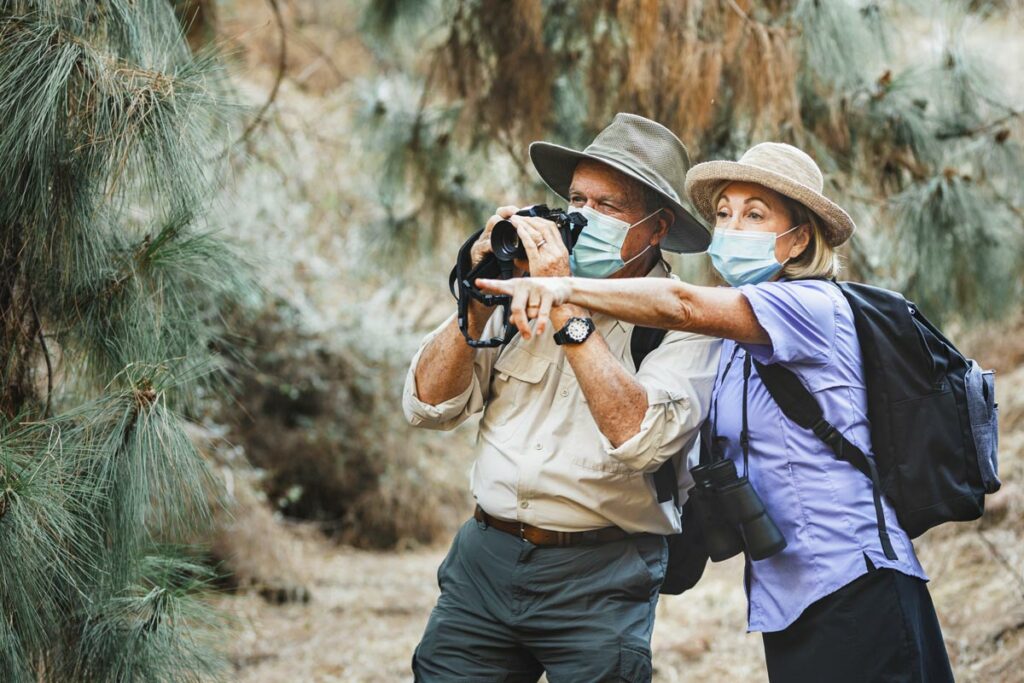 Atlas Senior Living | Seniors walking with binoculars