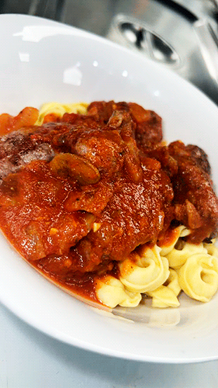 Braised short ribs, served with Bolognese sauce on a bed of Tortellini, paired with scalloped potatoes.