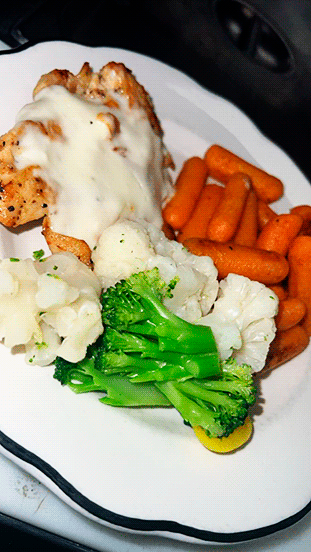 Lime Chicken Breast Marinated in a lime sauce, topped with our house secret sauce, paired with roasted carrots.