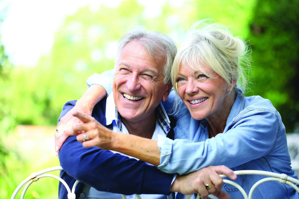 Legacy Ridge at Bookstone | Senior couple hugging outdoors