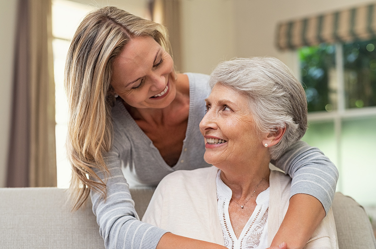 Legacy at Savannah Quarters | Woman embracing senior mother