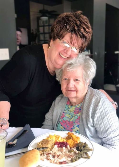 Madison Heights Evans | Senior eating Lunch Smiling