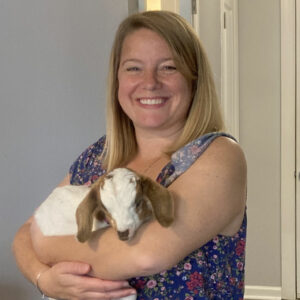 Madison Heights Evans | Woman with baby goat