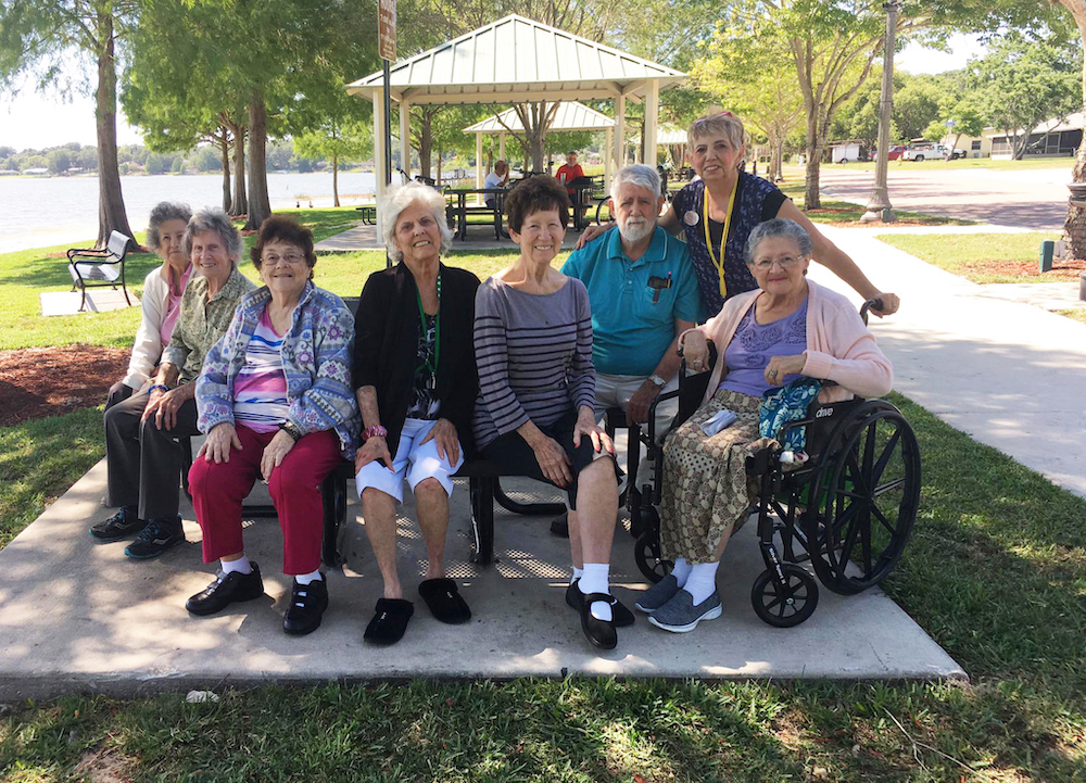 Madison at Ocoee | Residents and associate sitting outdoors