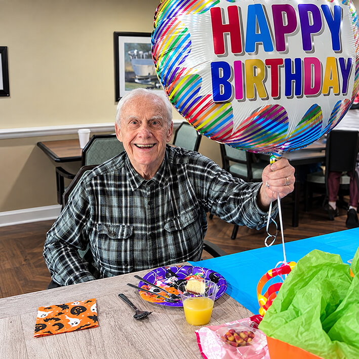 Joyful Birthday Celebration with Colorful Balloon