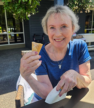 Lady with an Ice Cream in a Senior Living Community