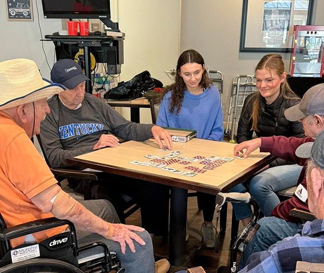 Senior Playing Board Game