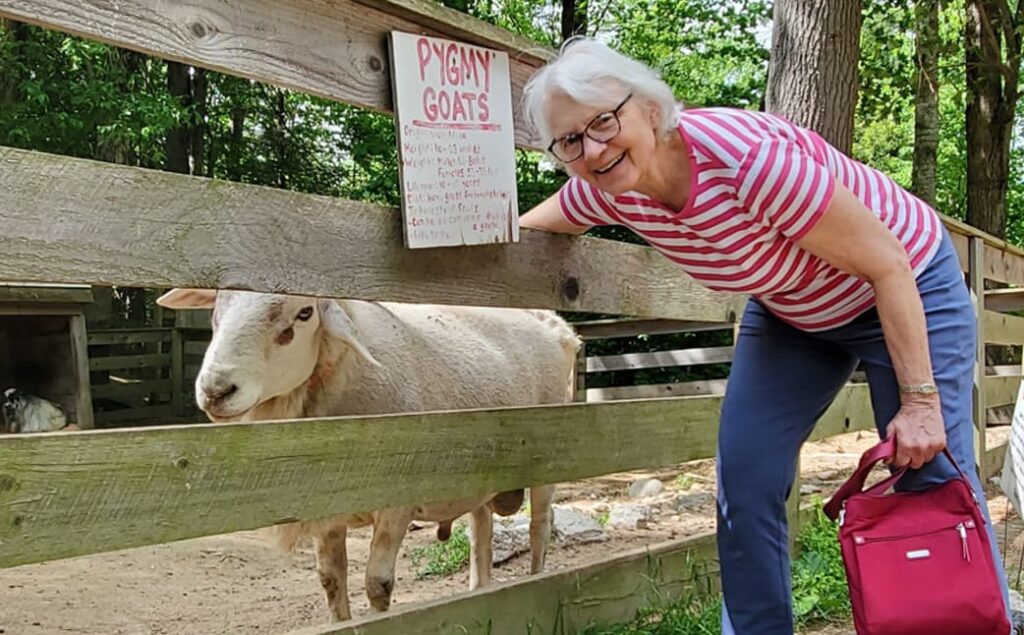 Senior with a Goat