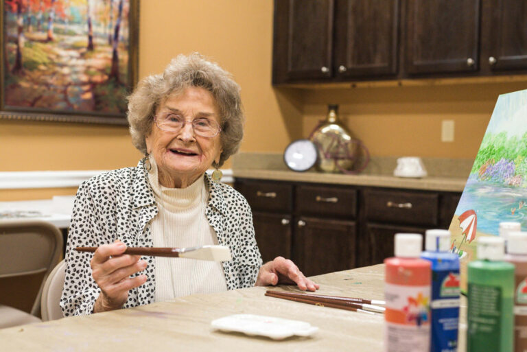 The Goldton at Spring Hill | Senior woman painting
