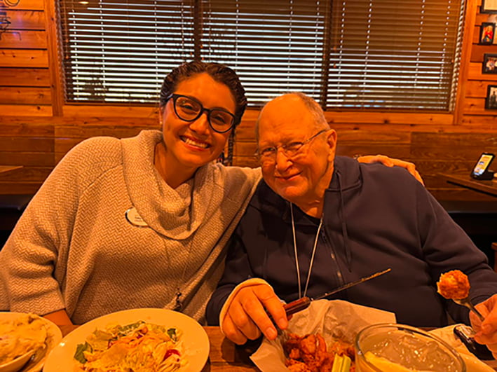 Senior-enjoying-dinner-goldton-at-spring-hill