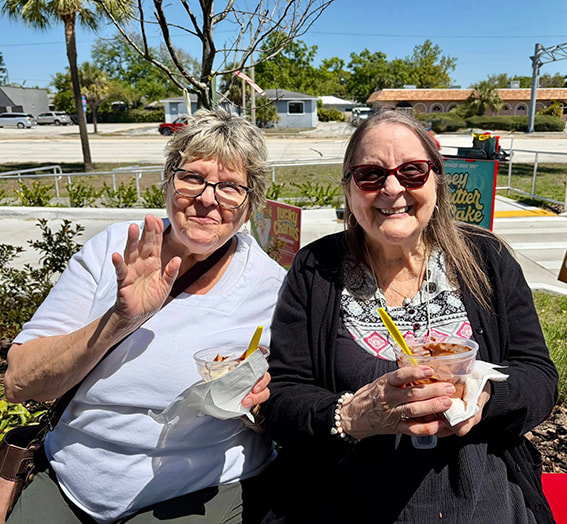 Seniors enjoying ice cream the goldton at st petersburg