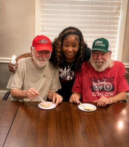 Residents enjoying a social activity at The Goldton at St. Petersburg, featured in our Memory Care in St. Petersburg, FL guide for families