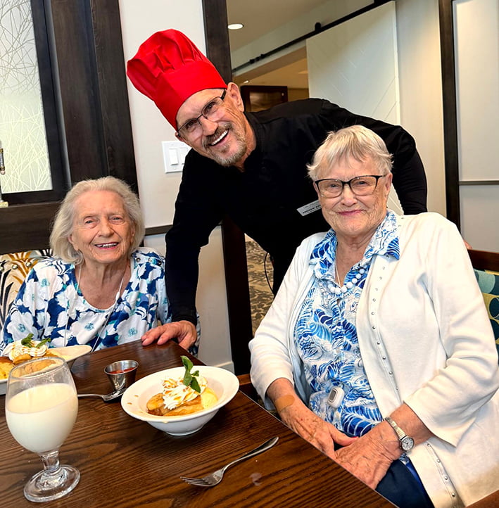 senior living enjoying their food