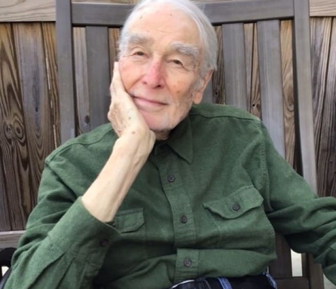 Male senior with a reflexive pose