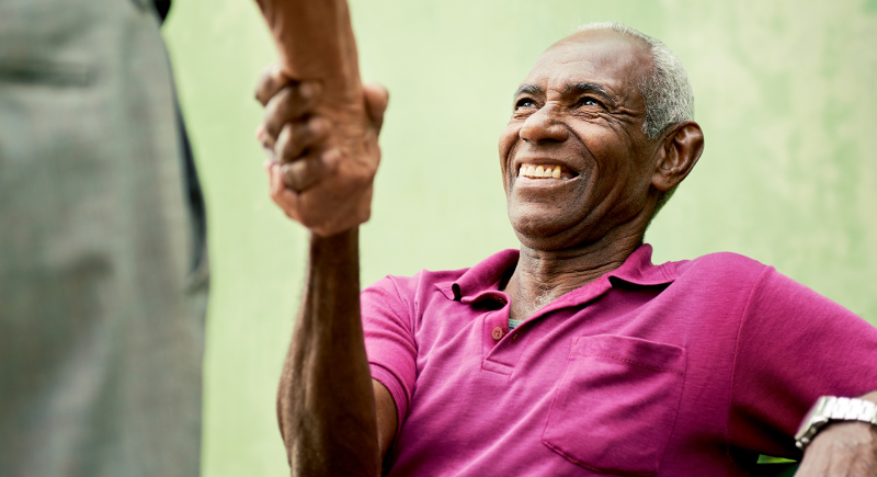 Atlas Senior Living | Senior man shaking hands