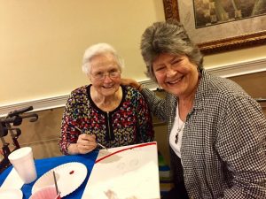 Angels for the Elderly | Senior woman painting