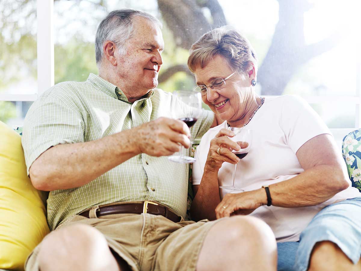 Atlas Senior Living | Senior couple enjoying a glass of wine