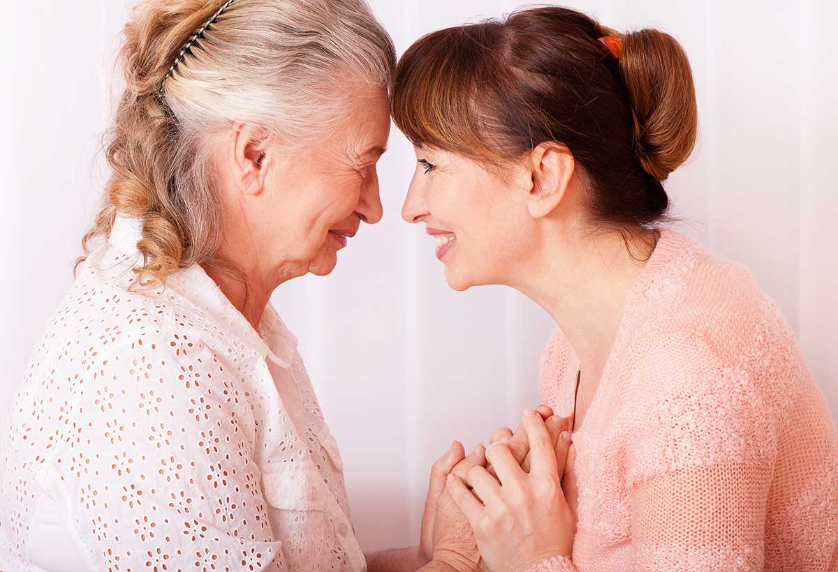 Atlas Senior Living | Senior woman smiling with grandaughter