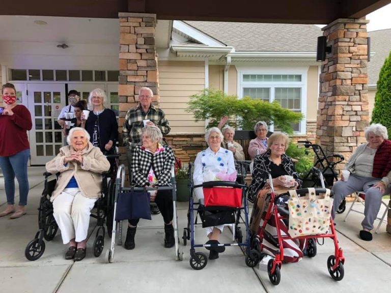 Atlas Senior Living | Senior Residents Sitting Outside