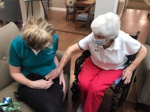Atlas Senior Living | Senior woman with therapy bunny